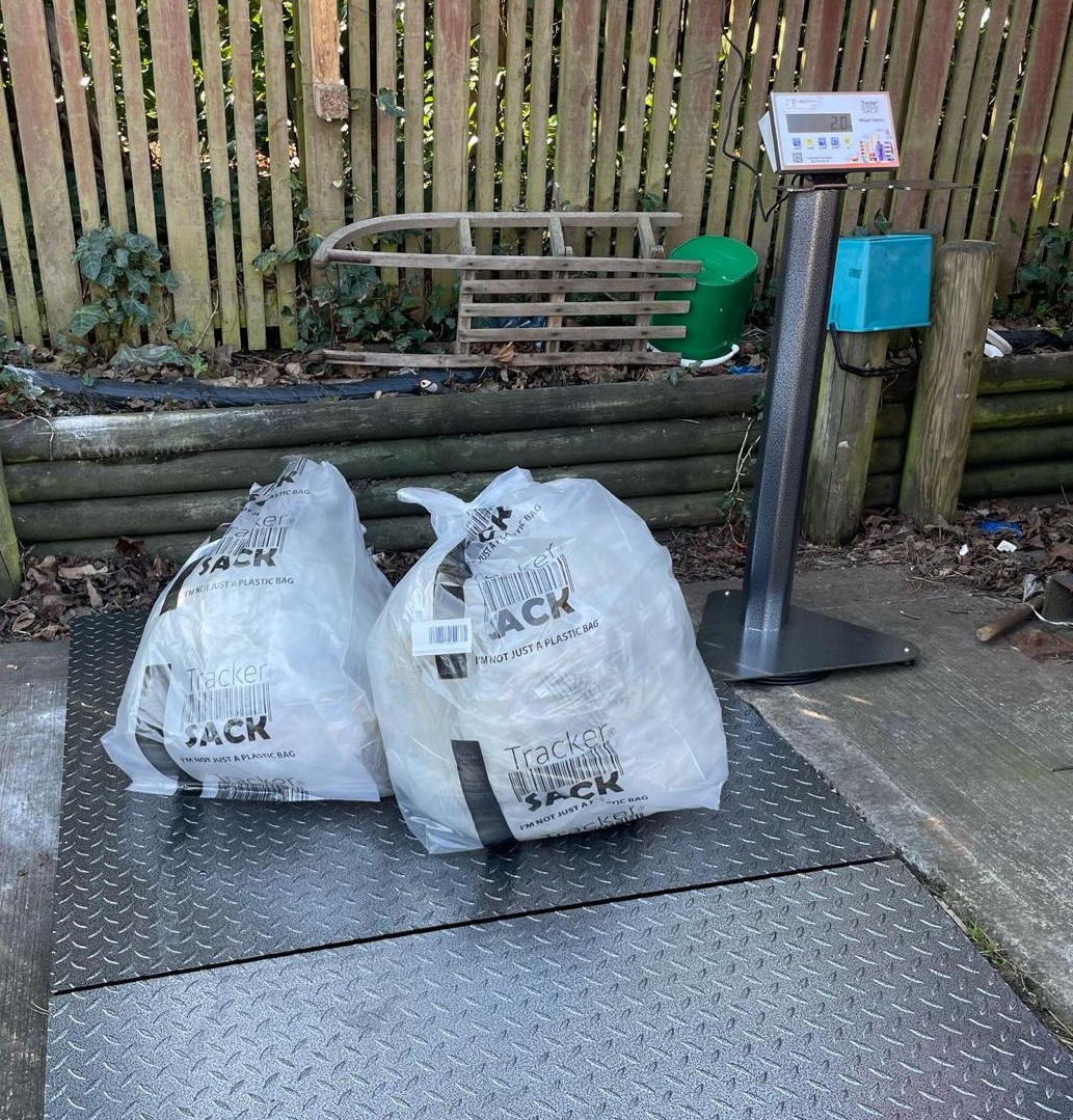 TrackerSacks being weighed on a scale for data capture